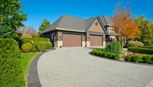Upgrade Your Curb Appeal with Beautiful Paved Concrete Driveway in Lima, OH - Enhance Your Property Value and Convenience with a Durable and Smooth Surface for Your Vehicles with a Wide Range of Customizable Options to Choose From.