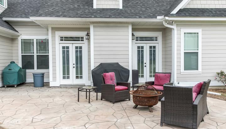 Elevate Your Outdoor Living Space with Stunning Stamped Concrete Patio in Lima, OH - Choose from a Variety of Creative Patterns and Colors to Achieve a Unique and Eye-Catching Look for Your Patio with Long-Lasting Durability and Low-Maintenance.